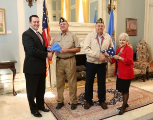 State Rep. Sean Roberts, Steve Swinford, Jim Frazier, and retired Air Force Maj. Gen. Rita Aragon. Sean_Roberts_American_Legion_Flag_Presentation